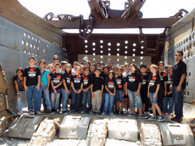 Community relations are important at White Rock Quarries in Miami, FL, which hosts field trips for area schools and other organizations with its mining contractor, North American Mining Corp. Here, NAMCs Ed Barnett and Hubie Perez, and WRQs Ronnie VanLandinham lead a tour. (Photos by Linda Maddy)