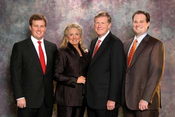PROUD FAMILY  Leo A. Vecellio, Jr., CEO of the family owned Vecellio Group, receives congratulations from his wife, Kathryn, and their sons Christopher, left, and Michael, after his election as ARTBA Chairman.